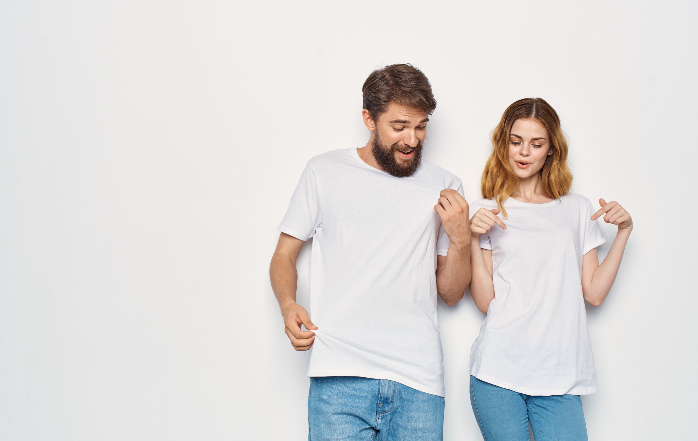 Young Couple in White T-Shirts Communication Fashion Fun